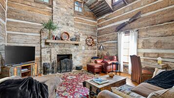 Cabin, 4 Bedrooms | Living area | Smart TV, streaming services