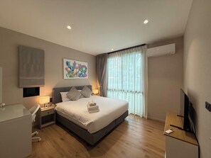 Family Apartment, Pool View | In-room safe, blackout drapes, soundproofing, iron/ironing board