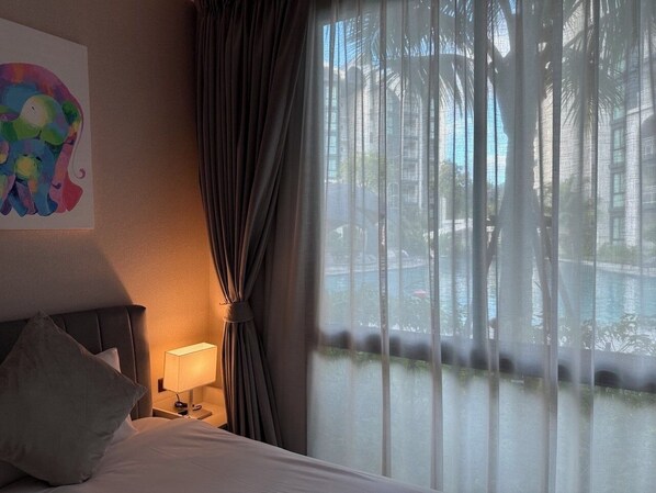 Family Apartment, Pool View | In-room safe, blackout drapes, soundproofing, iron/ironing board