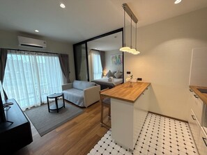 Departamento superior, vista a la montaña | Área de sala de estar