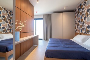 Apartamento, 1 cama de matrimonio con sofá cama, no fumadores, vistas a la ciudad | Caja fuerte, espacio para trabajar con un portátil, cortinas opacas