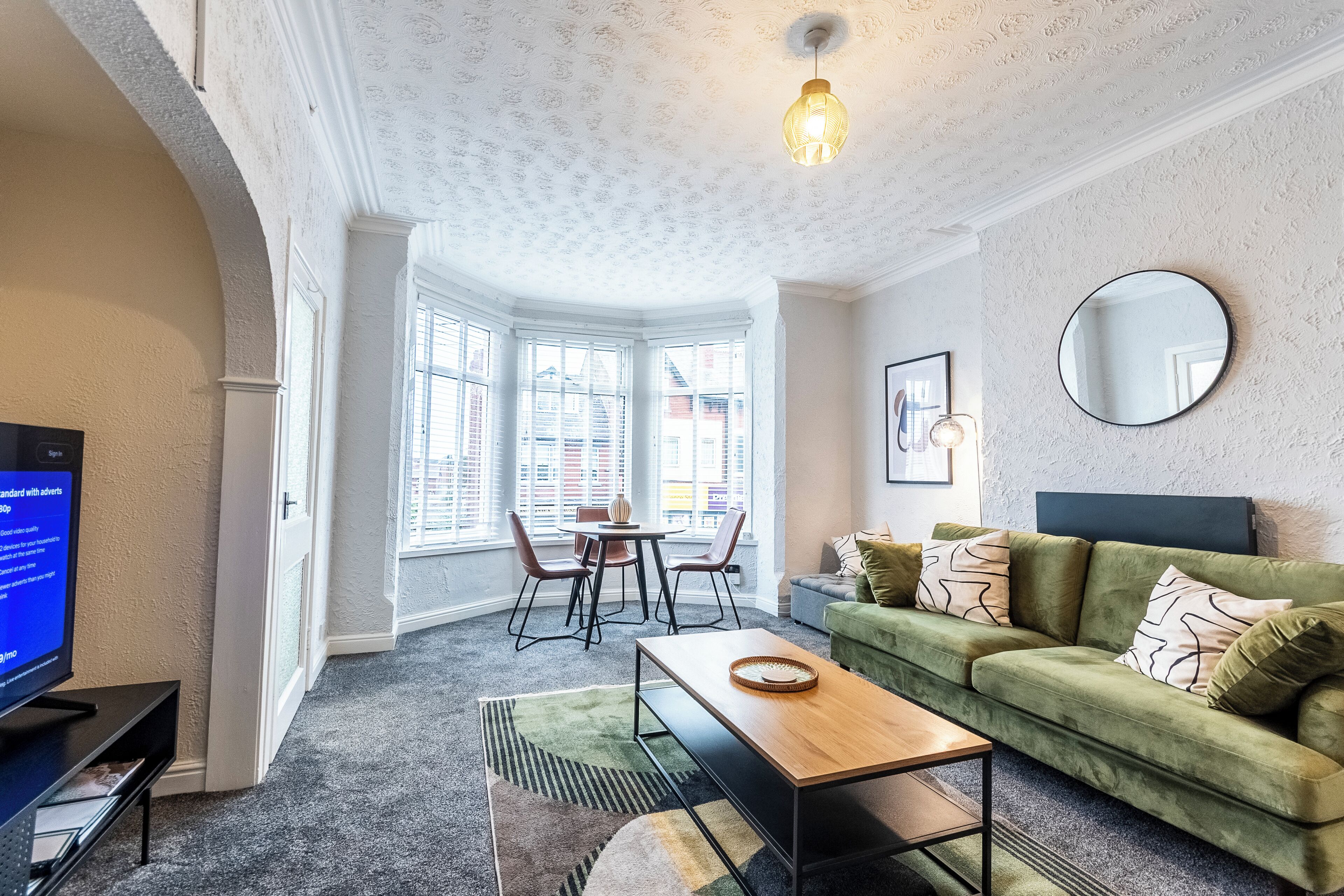 Apartamento, 1 cama King e sofá-cama | Área de estar