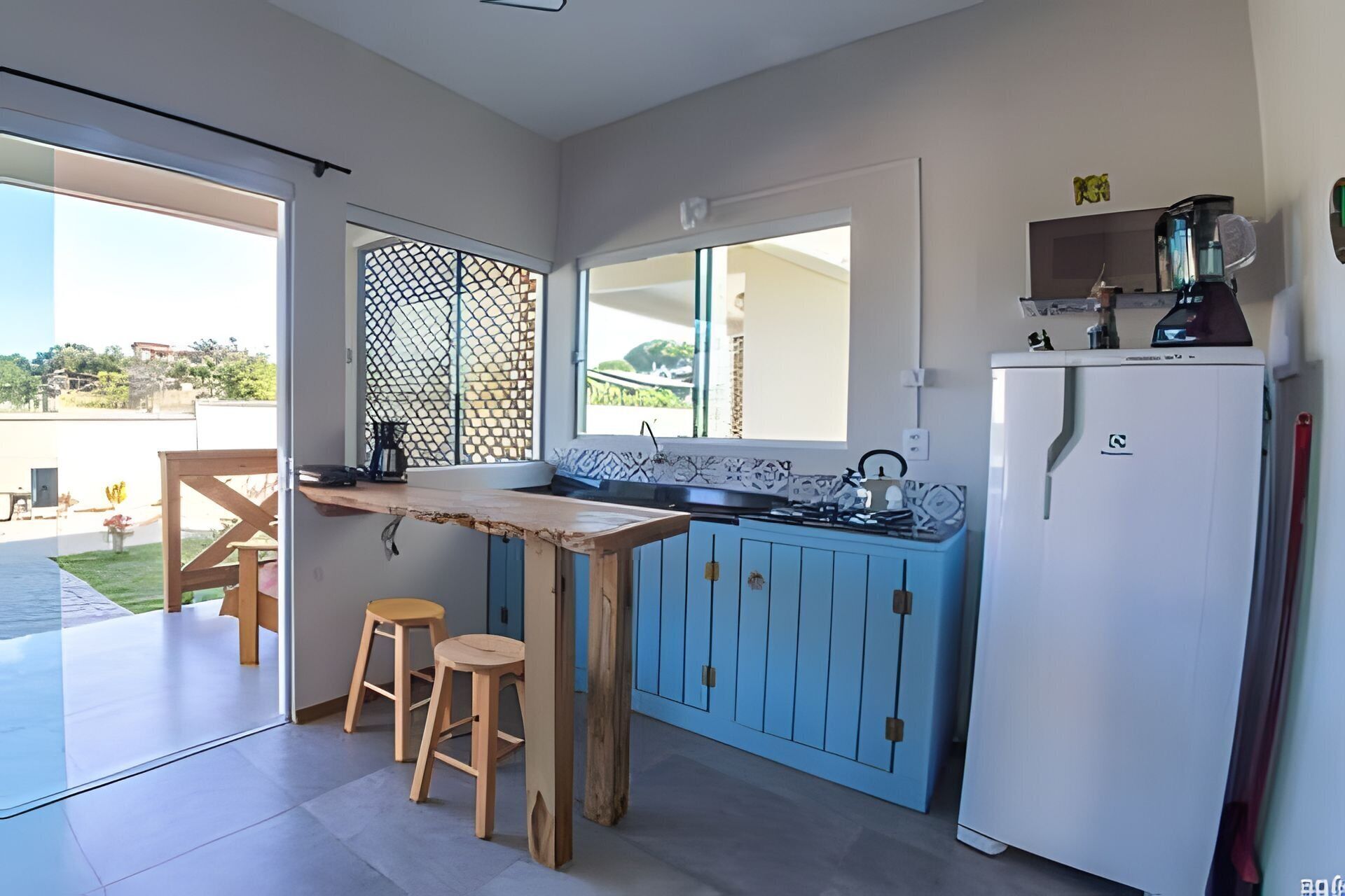 Microwave, cookware/dishes/utensils, cleaning supplies