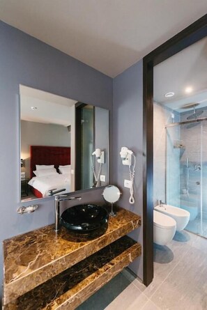 Deluxe Double Room, Balcony | Bathroom | Slippers