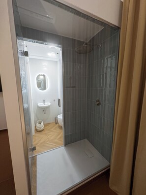 Double Room, Balcony, Courtyard View | Bathroom | Shower, free toiletries, hair dryer, towels
