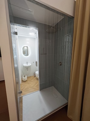 Double Room, Balcony, Courtyard View | Bathroom | Shower, free toiletries, hair dryer, towels