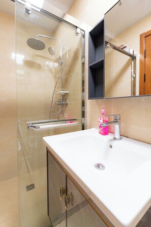 Hair dryer, bidet, towels, soap
