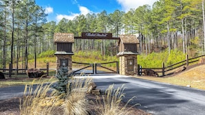A gated entrance with a sign reading "Thirteen Hundred."