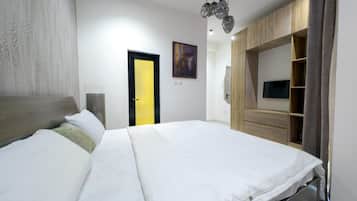 Premium bedding, down comforters, individually decorated