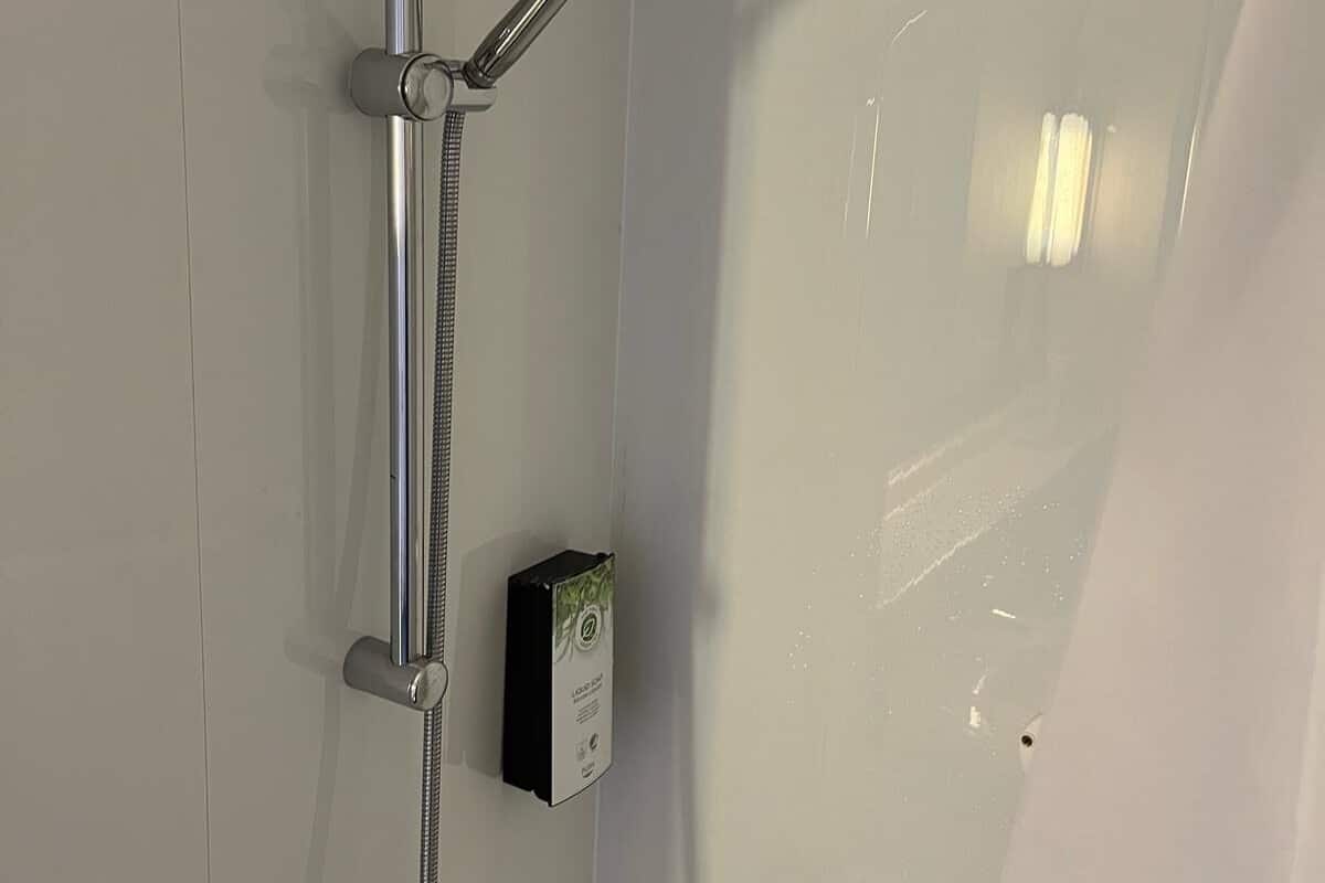Hair dryer, towels, soap, shampoo