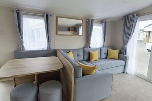 Cottage | Living area - Lyons Sunnysands Holiday Park - Holiday Accommodation 13733 (Talybont)