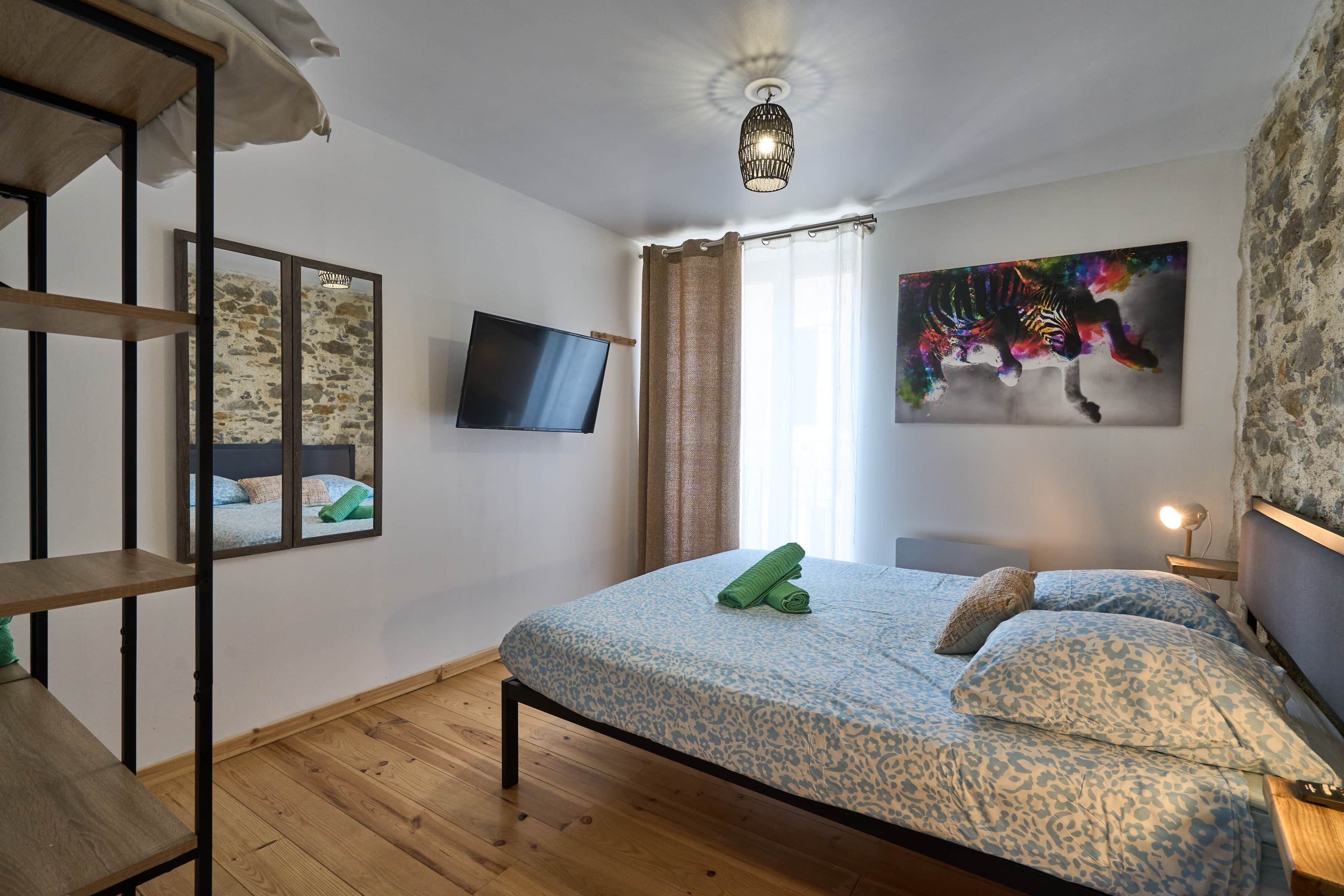 2 slaapkamers, een strijkplank/strijkijzer, gratis wifi, beddengoed