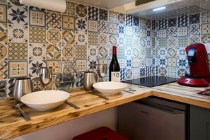 Fridge, microwave, toaster, cookware/dishes/utensils