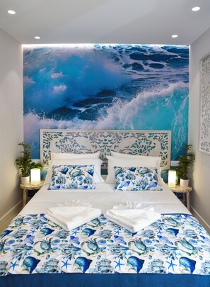 1 bedroom, desk, iron/ironing board, travel crib