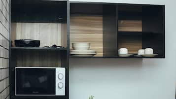 Deluxe Apartment, Balcony, City View | Private kitchen | Fridge, microwave, oven, stovetop