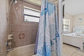 Shower, hair dryer, towels, soap