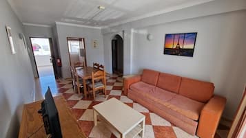 Departamento, 1 habitación | Área de sala de estar