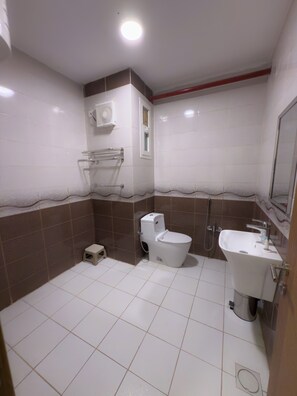 Hair dryer, towels, soap, shampoo