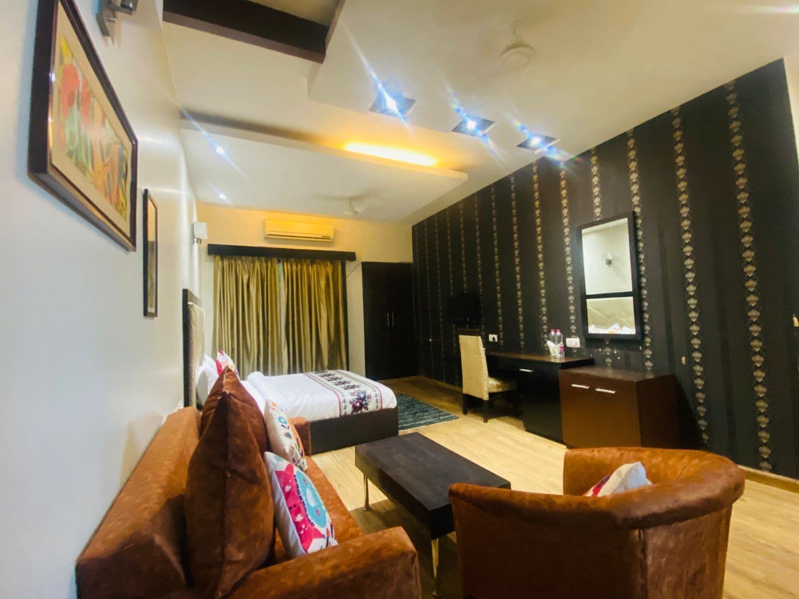 Select Comfort beds, desk, laptop workspace, blackout curtains