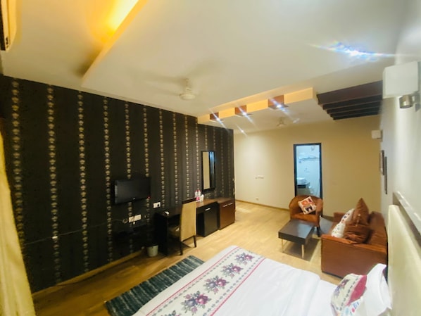 Desk, laptop workspace, blackout drapes, iron/ironing board