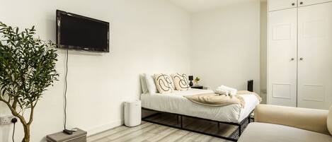 1 غرفة نوم ومكواة/لوح كي وواي فاي مجانًا وملاءات أسرّة