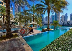 2 outdoor pools, pool umbrellas, sun loungers