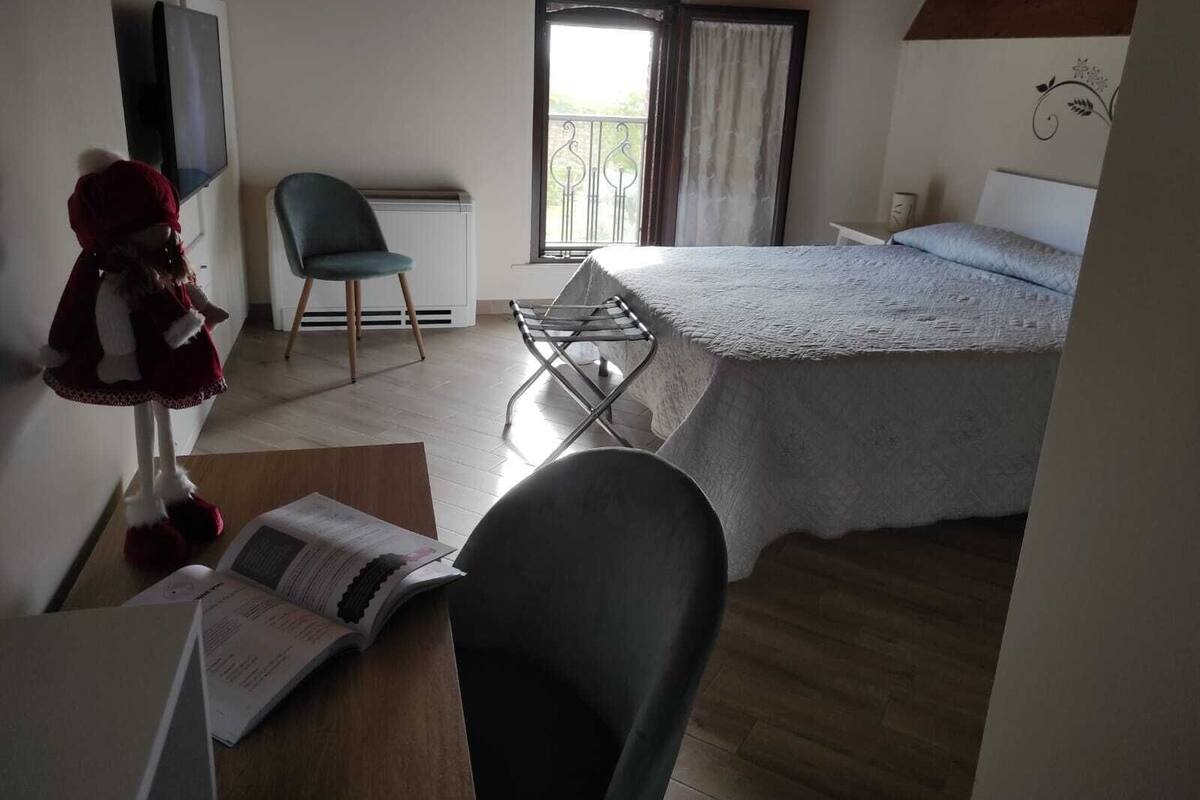 Junior Suite, Garden View | Desk, iron/ironing board, free WiFi