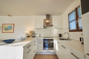 Fridge, microwave, dishwasher, coffee/tea maker