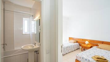 Apartment, 1 Bedroom | Bathroom | Towels, toilet paper