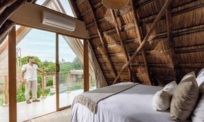 Double Room, Balcony, Pool View | Minibar, in-room safe