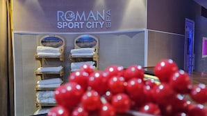 A spa area with a sign reading "ROMANS SPORT CITY SPA". - Residence Roman (Pomezia)