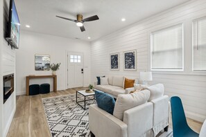 TV, fireplace - Modern Indy Retreat with Hot Tub, Outdoor Oasis, Prime location to Lucas Oil (Indianapolis)