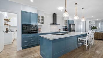 Microwave, stovetop, dishwasher, coffee/tea maker