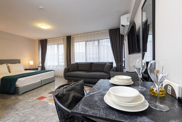 Desk, laptop workspace, blackout curtains, iron/ironing board