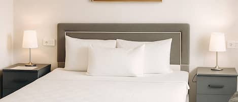 Desk, laptop workspace, blackout curtains, iron/ironing board