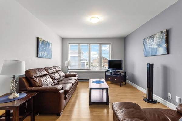 Bright Living Room with Big Windows -
Relax and recharge in natural light.