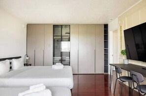 Iron/ironing board, travel crib, WiFi, bed sheets