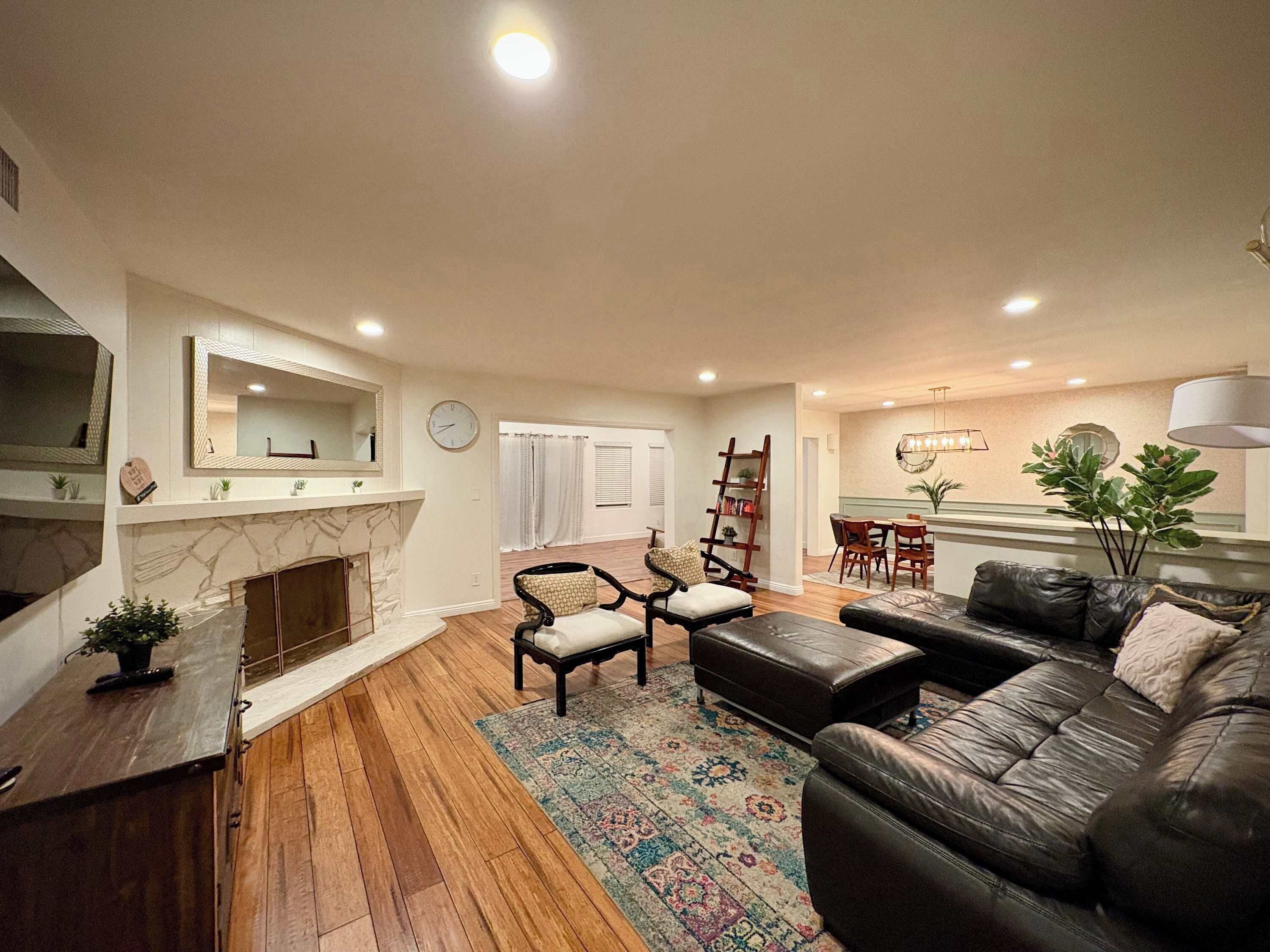 TV, fireplace, books, offices