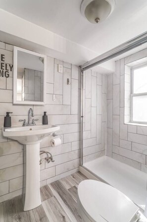 Hair dryer, towels, soap, shampoo