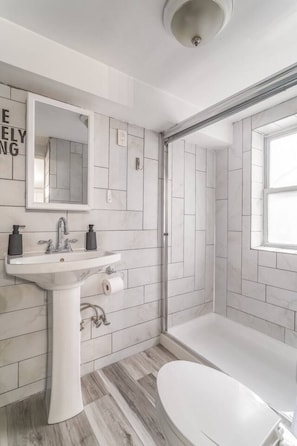 Hair dryer, towels, soap, shampoo