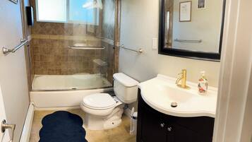 Hair dryer, towels, soap, shampoo