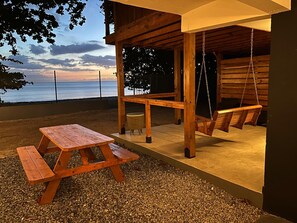 Outdoor dining - Oceanview Coastal Retreat | 2BR Getaway (Mayaguez)