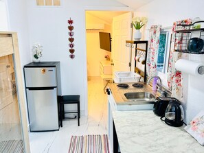 Fridge, microwave, dishwasher, coffee/tea maker