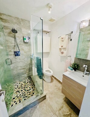 Hair dryer, towels, soap, shampoo