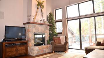 Smart TV, fireplace, foosball