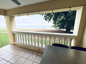 Outdoor dining - Beachfront Modern Apt with Direct Sand Access in Sunny Rincon - Villa Sanfe (Rincón)