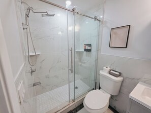 Shower, hair dryer, towels, soap