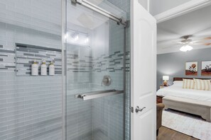 Shower, hair dryer, towels, soap
