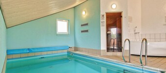 Hus med badstue ved havet i Spøttrup