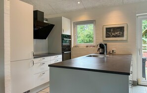 Fridge, dishwasher, coffee/tea maker